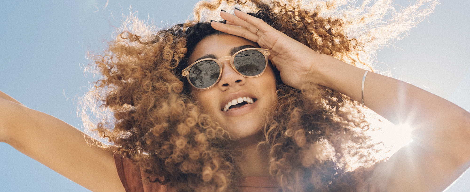 - girl looking fantastic in polarized sunglasses
