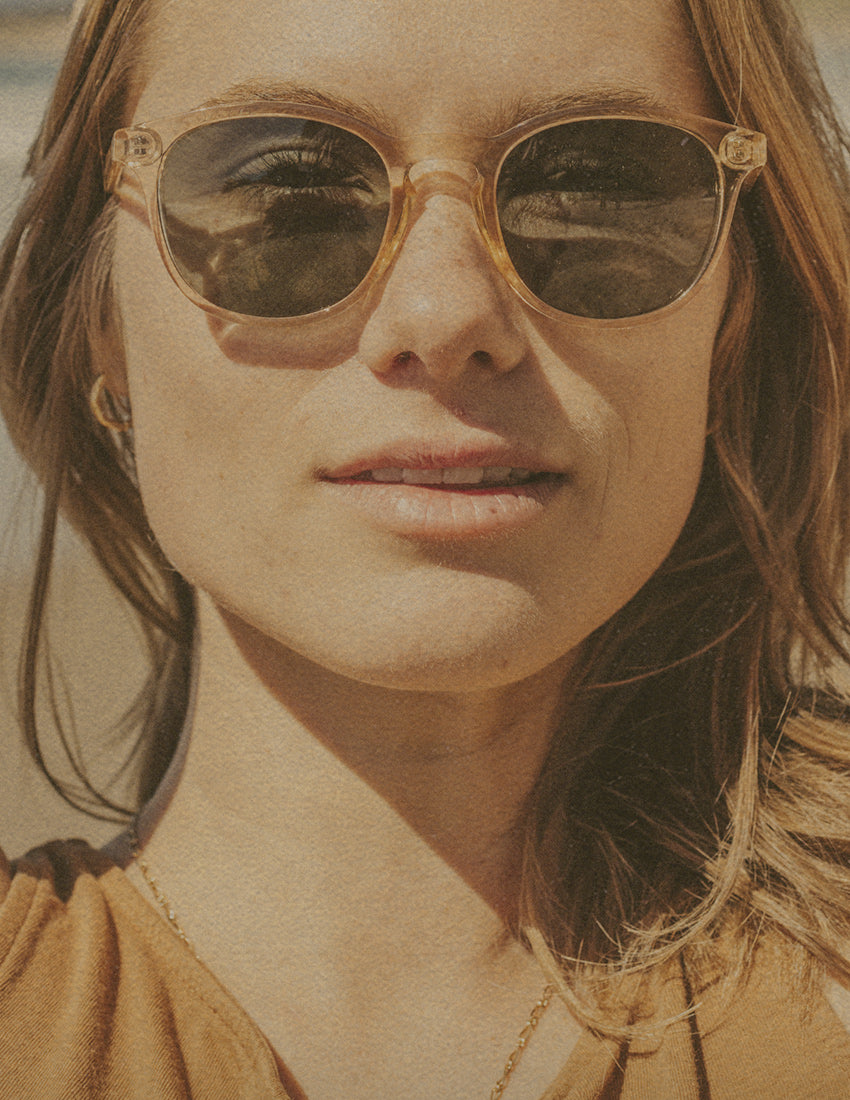 woman wearing sunski yuba clear sunglasses