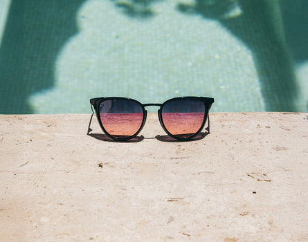sunski catalina sunglasses next to pool