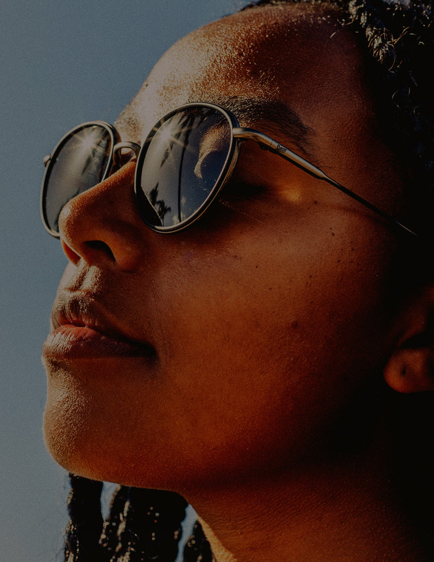 profile of girl wearing sunski baia sunglasses