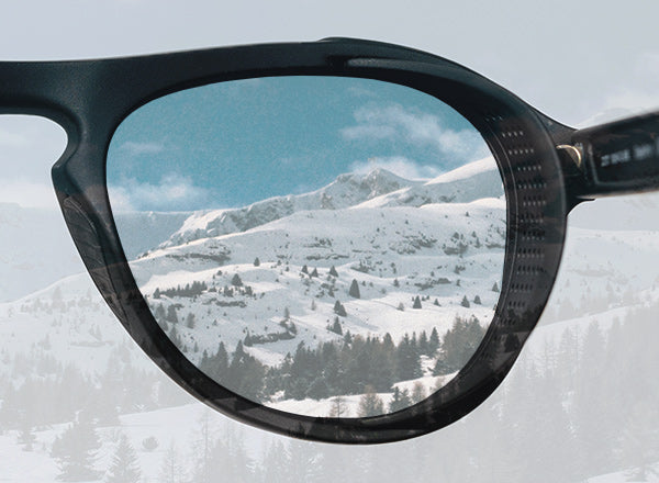mountains through sunglasses lens