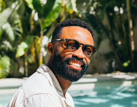 avila pine tortoise amber on a man at the pool