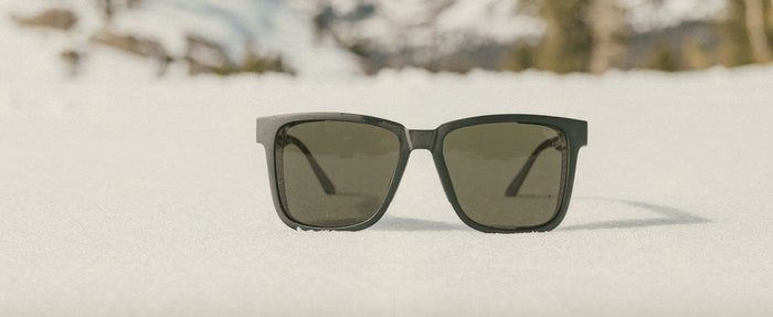 sunski couloir sunglasses in the snow