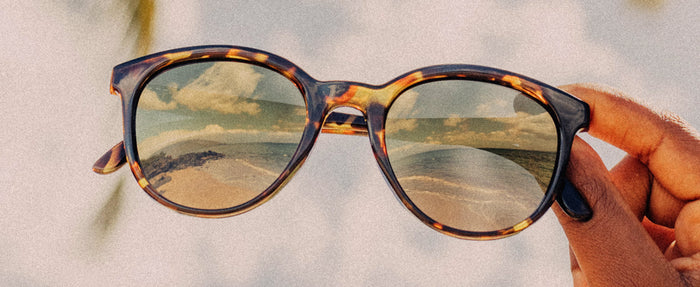 hand holding sunski makani sunglasses
