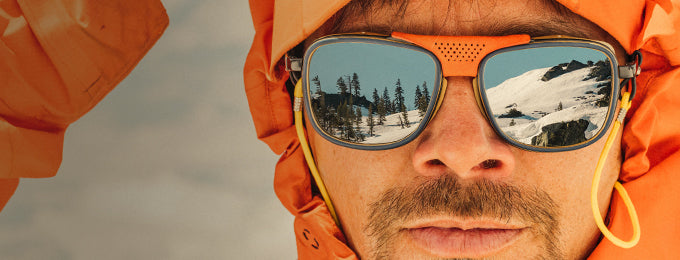 man adventuring in sunski alpine sunglasses