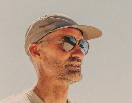 profile of man wearing sunski astra sunglasses