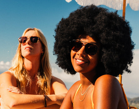 two girls wearing sunski estero sunglasses