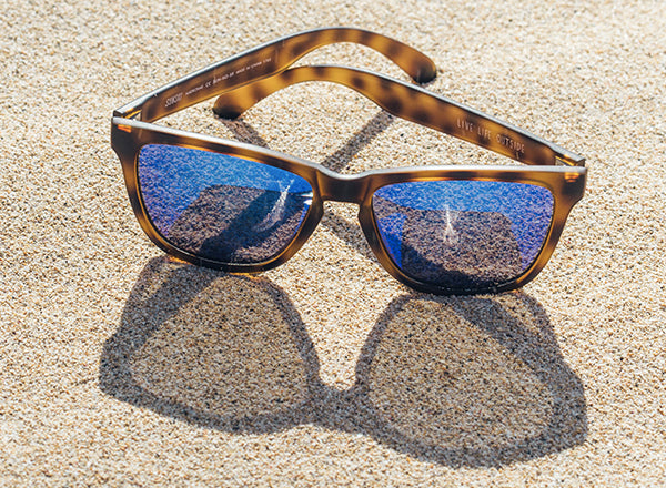 sunski madrona sunglasses in the sand