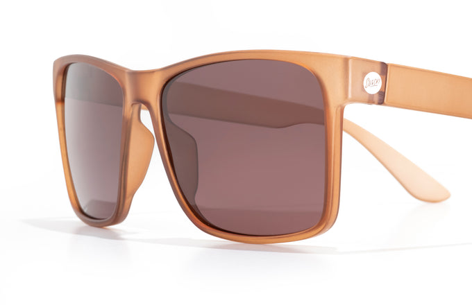 sunski puerto sienna ruby close up three quarter angle