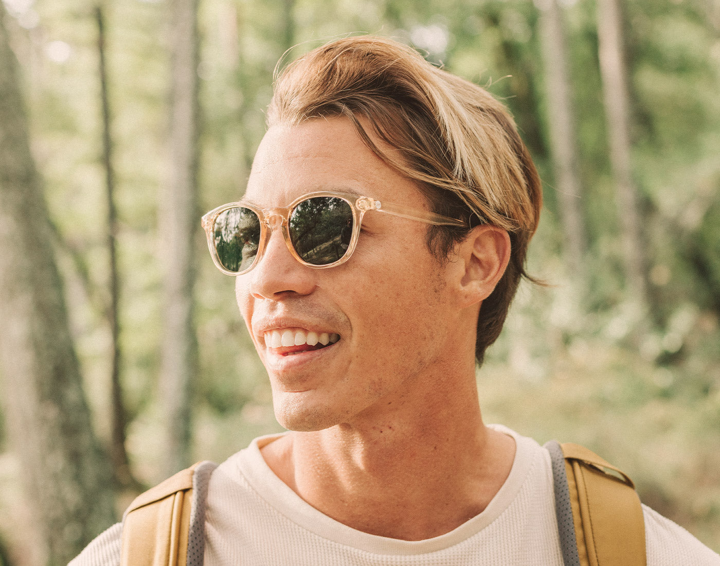 guy hiking wearing sunski yuba sunglasses