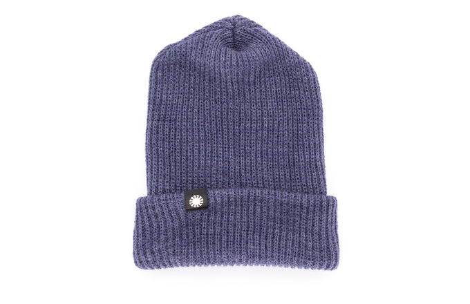 sunski shoulder season beanie denim flat lay