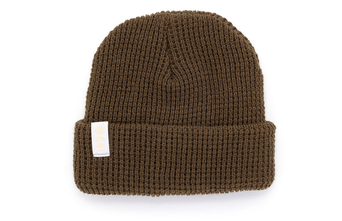 sunski winter sun beanie forest flat lay