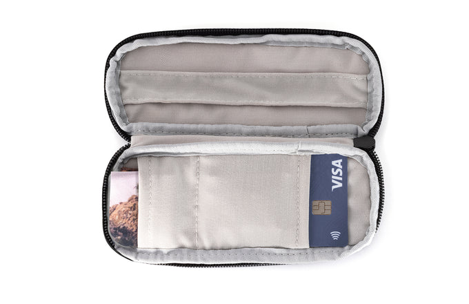 sunski zipper case navy laying open with cards