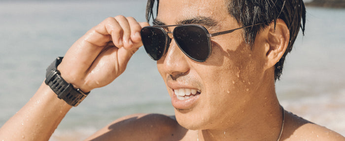 Profile of man wearing sunski polarized sunglasses for men