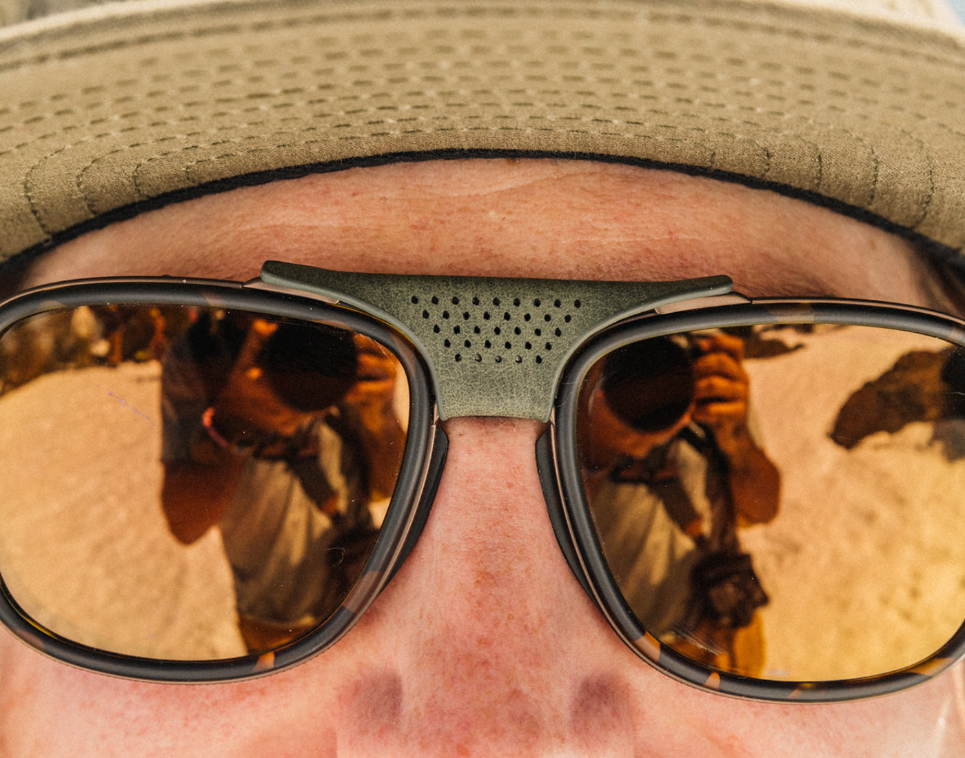 close up of sunski ferrata olive centerpiece on sunglasses