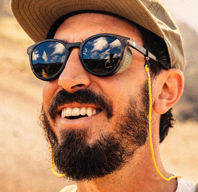 guy smiling wearing sunski tera sunglasses