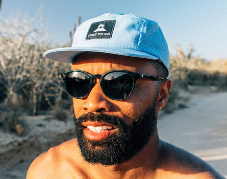 close up of guy wearing sunski chase the sun hat
