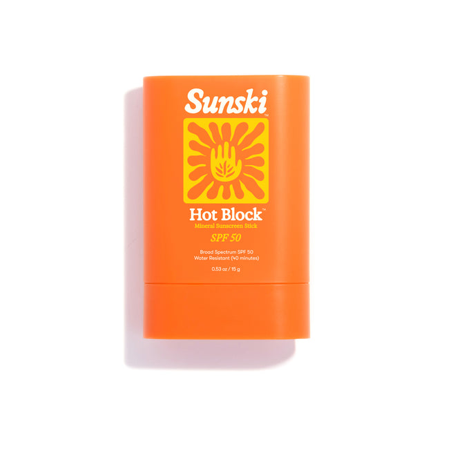 Orange Sunsiki Hot Block SPF 50 sunscreen stick on a white background
