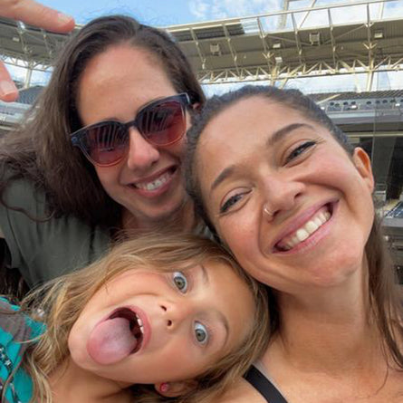 woman in miho sunglasses with children