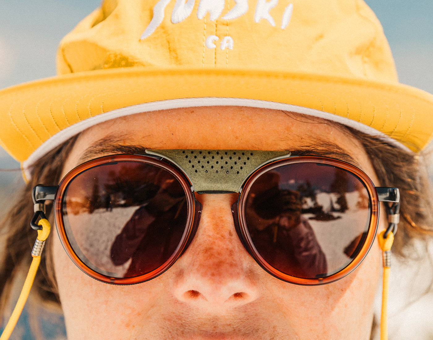 sunski strada centerpiece olive on sunski strada rust amber sunglasses