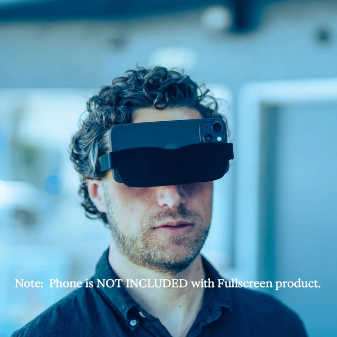 Man wearing a futuristic visor with a blurred indoor background.  PHONE NOT INCLUDED