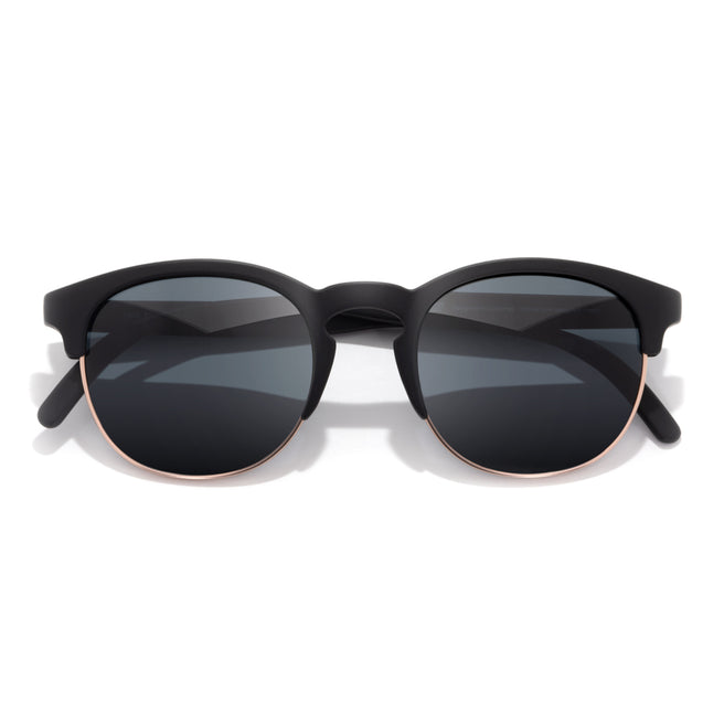 Black sunglasses with a white background