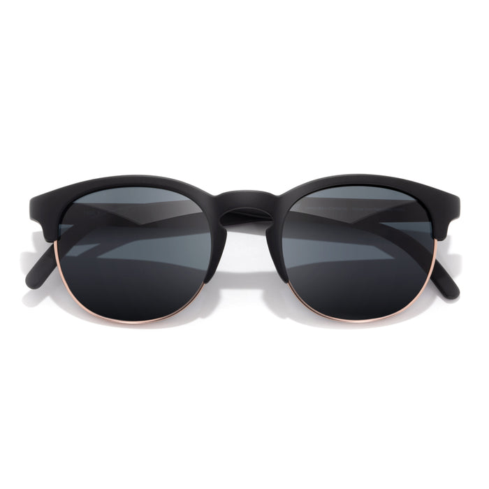 Black sunglasses with a white background