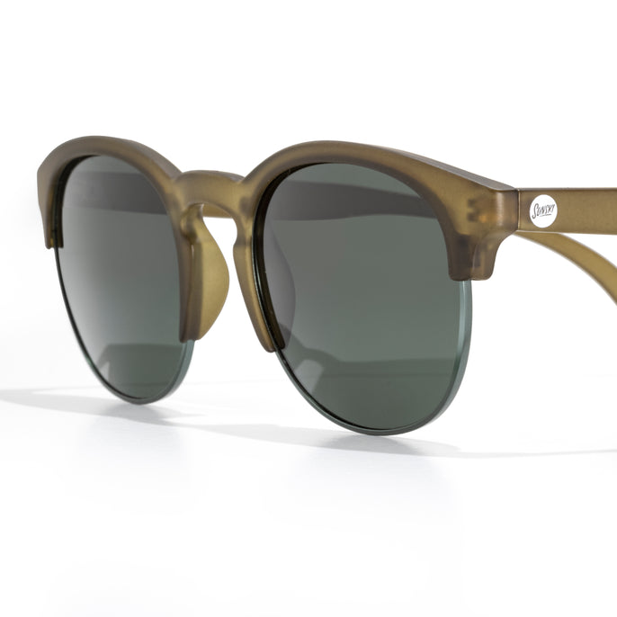 Brown sunglasses with dark lenses on a white background