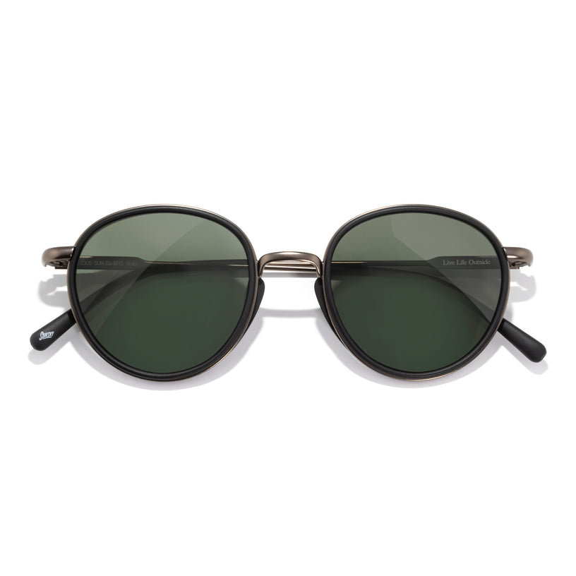Round sunglasses with dark lenses on a white background