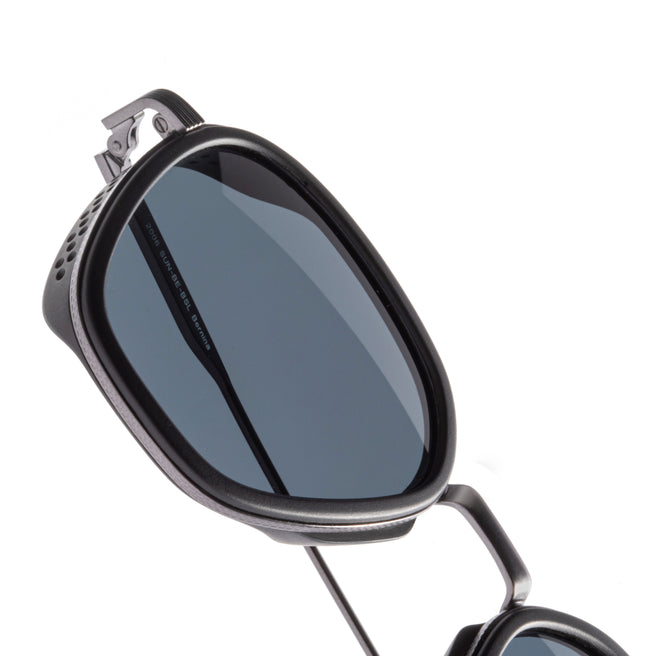 Bernina - Black Slate - Sunglasses with a reflective lens on a white background