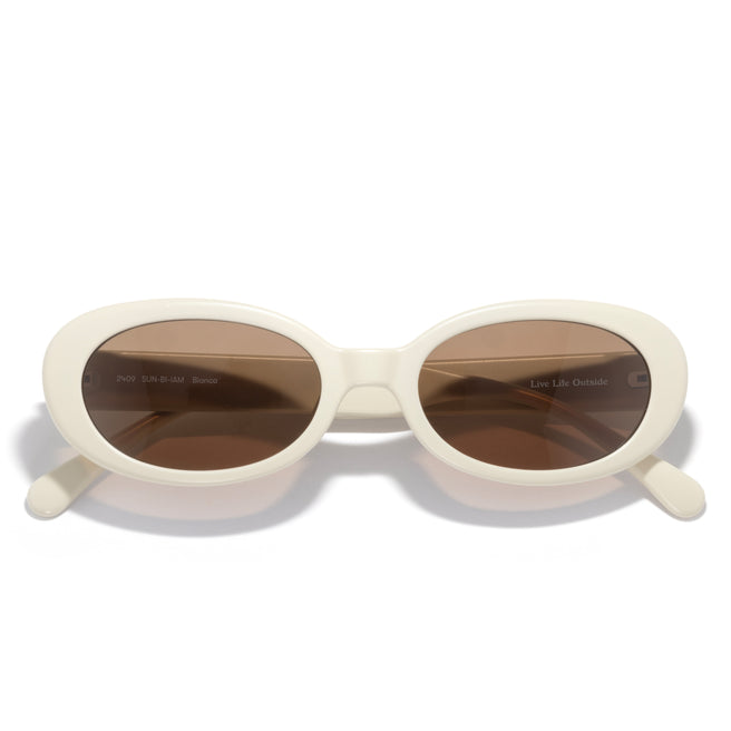 white sunglasses on white background with amber lens