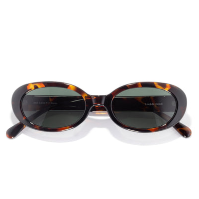 Bianca - Tortoise Forest - Sunglasses with tortoiseshell frame and dark lenses on a white background