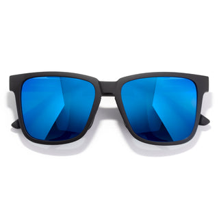 Sunglasses with blue reflective lenses and black frame on a white background