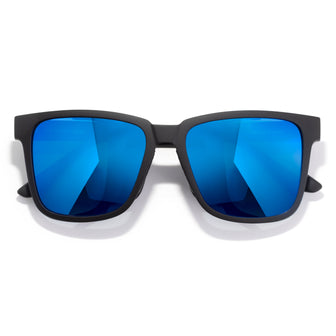 Sunglasses with blue reflective lenses and black frame on a white background
