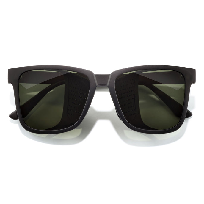 Couloir - Black Forest - Black sunglasses with dark lenses on a white background