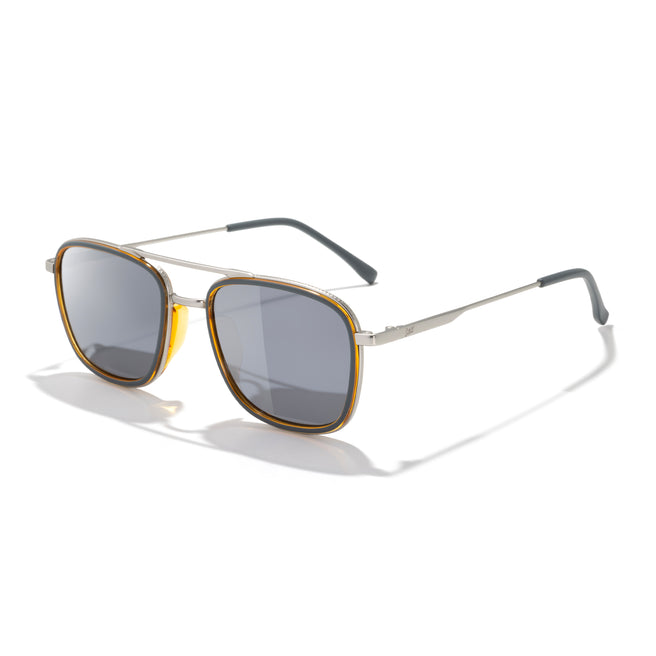 Sunglasses with gold and black frame on a white background