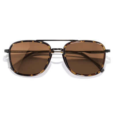 Estero - Tortoise Amber - Sunglasses with brown lenses and tortoiseshell frame on a white background