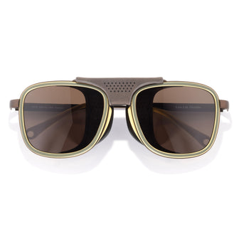 Sunglasses with gold frame and brown lenses on a white background