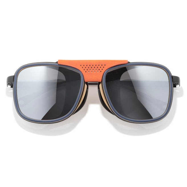 Sunglasses with orange frame and reflective lenses on a white background