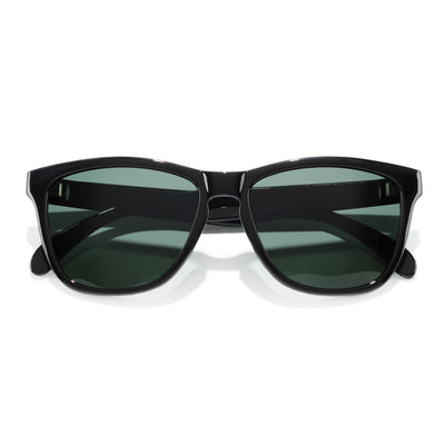 Headland - Black Forest - Black sunglasses with green lenses on a white background