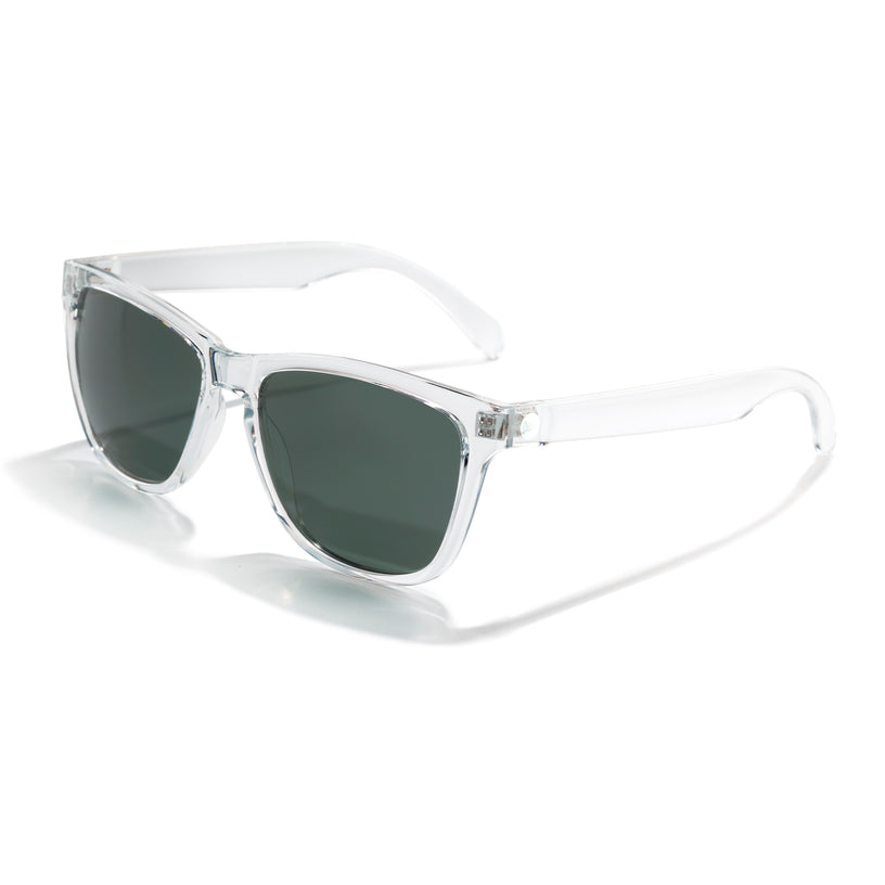 Clear frame sunglasses with dark lenses on a white background