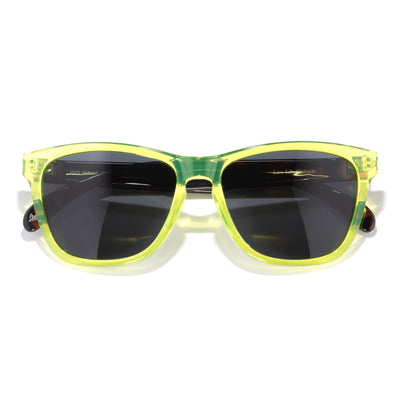 Headland - Lime Tortoise Slate - Sunglasses with yellow frame and dark lenses on a white background