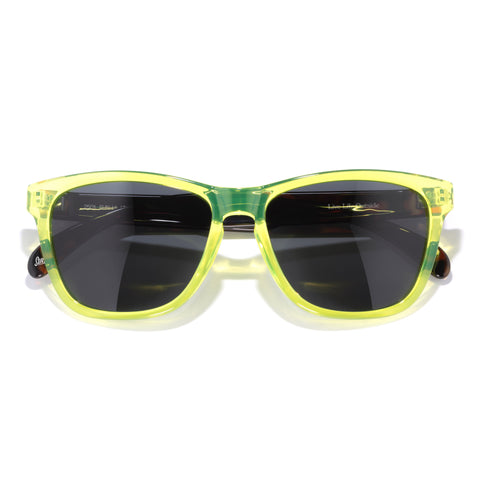 Sunglasses with yellow frame and dark lenses on a white background
