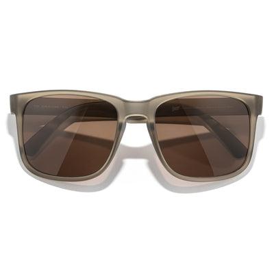 Kiva - Cola Amber - Sunglasses with brown lenses and a beige frame on a white background