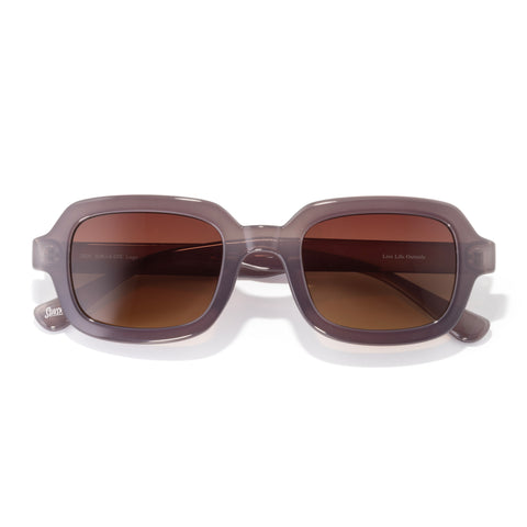 Sunglasses with brown lenses and gray frames on a white background