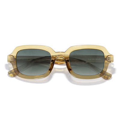 Lago - Seaweed Forest Fade - Gold-framed sunglasses with dark lenses on a white background