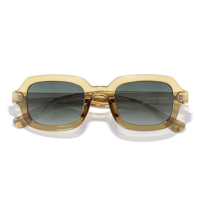 Gold-framed sunglasses with dark lenses on a white background