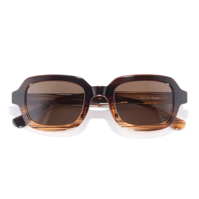 Sunglasses with brown gradient lenses on a white background