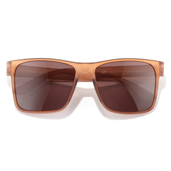 Brown sunglasses with a reflective surface on a white background