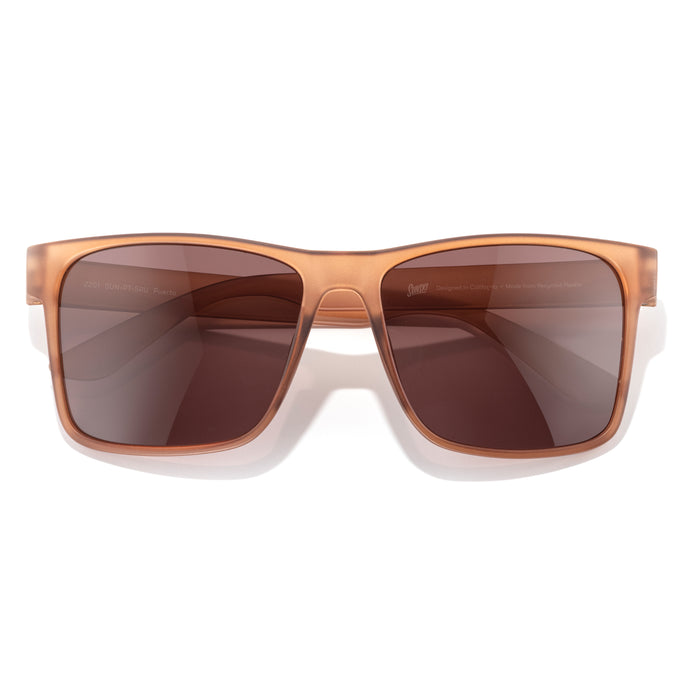 Puerto - Sienna Ruby - Brown sunglasses with a reflective surface on a white background